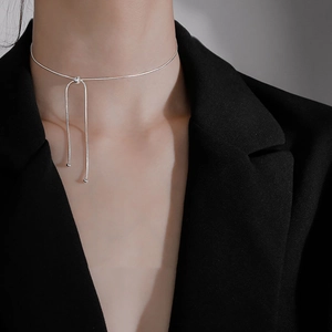 Minimalist S925 silver beaded drawstring necklace on model with black blazer