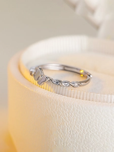Elegant S925 silver butterfly ring featuring a braided band and micro-inlaid zircons
