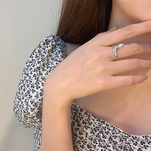 Elegant S925 sterling silver snake ring with green eyes and sparkling cubic zirconia stones