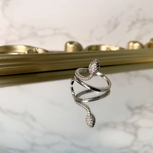 Ins style silver snake ring with micro-paved zircons and green gemstone eyes for women