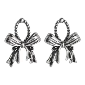 Vintage S925 silver bow stud earrings with black zircon center in retro distressed style