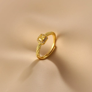 Luxurious S925 silver ring with yellow square diamond and twisted band in 45-degree view