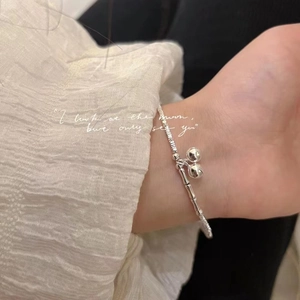 Silver Plated Copper Bracelet With Bell Charms And Bamboo Joint Design Elegant Crushed Silver Style Jewelry For Women