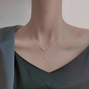 Elegant S925 silver wheat ear pendant necklace with sparkling zircons on a model
