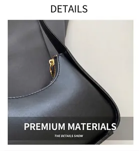 Nahaufnahme der schwarzen Ledertasche mit hochwertigem Goldreißverschluss und Nähten