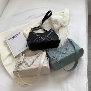 Chic quilted rhombic chain shoulder bags in black, cream, and blue colors