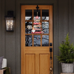 Vertical wooden Christmas sign with Gnome and Gingerbread Man on a light brown door