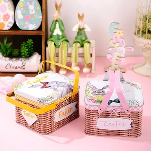 Detailed view of colorful Easter tinplate baskets with rabbit prints and metal handles