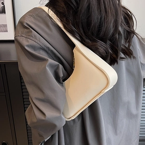 Schicke cremeweiße Hobo-Tasche aus Leder mit goldenem Reißverschluss für Damen Schulter