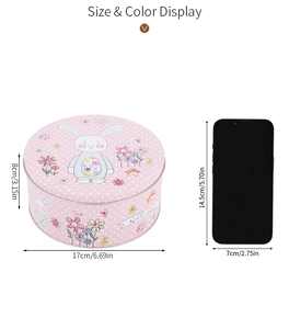 Boîte en fer lapin de Pâques à pois avec comparaison de taille par smartphone