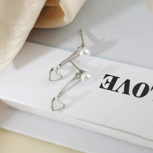 S925 silver heart pearl jacket earrings with white enamel finish and curved bar design