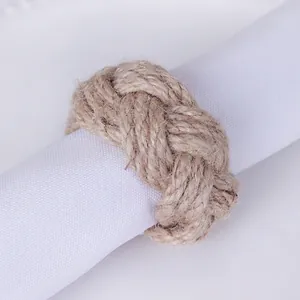 Natural woven jute napkin ring with vintage knot design for rustic table setting décor