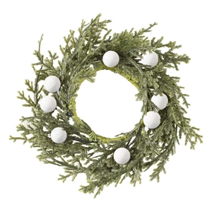Christmas napkin ring with green cedar needles and white berries for festive table decor