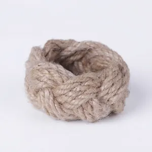 Handmade braided jute rope napkin rings set in natural brown for rustic table decor