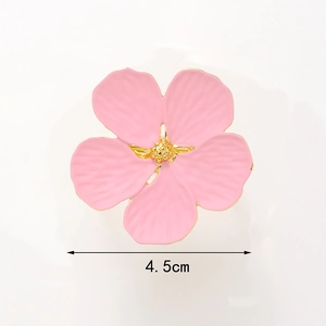 Portatovagliolo con fiore rosa in lega di zinco e bordo oro, diametro 4,5 cm