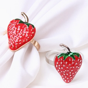 Creative strawberry napkin rings in red enamel with gold and silver metal bases