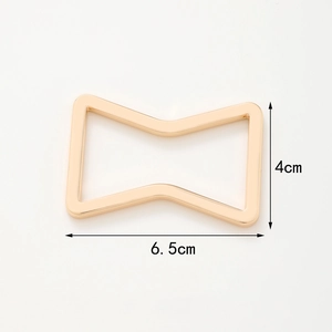 Golden bow-shaped metal hardware with 6.5cm length for decorative accessories