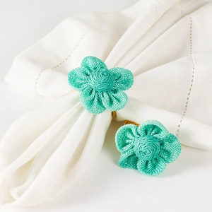 Set di 2 portatovaglioli artigianali in juta con fiori verde menta per decoro tavola