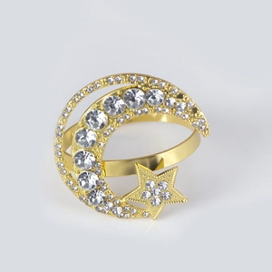 Golden crescent moon and star napkin ring with shimmering pavé crystal rhinestones