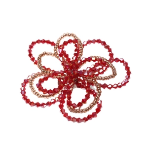 Handmade beaded flower napkin ring featuring deep red and champagne crystal glass beads