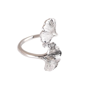Polished silver ginkgo leaf napkin ring with detailed vein texture for fine dining decor