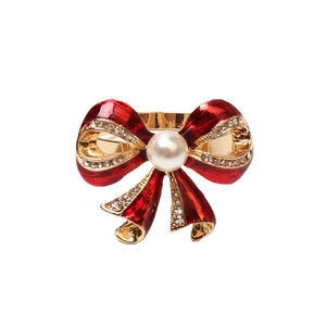 Elegant red enamel bow brooch with gold trim, white pearl center and sparkling crystals
