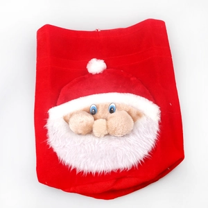 Christmas velvet gift bag with plush 3D Santa Claus figure and white pom-pom detail