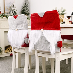 Gnome Christmas chair covers with heart pattern and white beard in festive home decor set