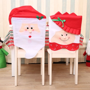 Christmas chair covers featuring Santa and Mrs. Claus designs for festive holiday dining decor