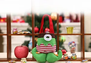 Detail of Christmas elf boot candy bag with festive stripes and curved toe design