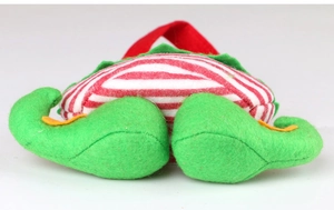 Detail of Christmas elf candy bag showing red straps and striped felt fabric texture