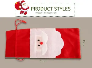 Detailed view of Santa Claus wine bottle gift bag with plush beard and red drawstring