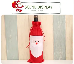 Detailed view of Santa Claus red velvet wine bottle gift bag with festive white beard