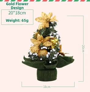Detailed 20cm mini Christmas tree with golden flowers and festive ornaments