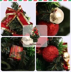 Macro details of mini Christmas tree with red bows, glitter balls, and fabric base