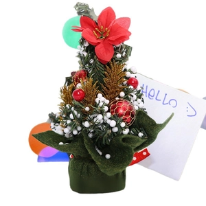 20cm mini Christmas tree with red flowers and snow-covered branches on green base