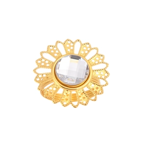 Detailed macro view of gold sunflower napkin ring with hollow patterns and crystal