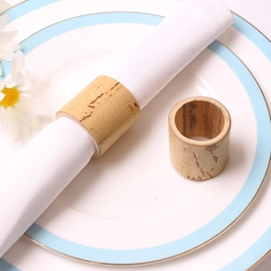 Natural bamboo napkin rings set of two on white ceramic plates for dining decor