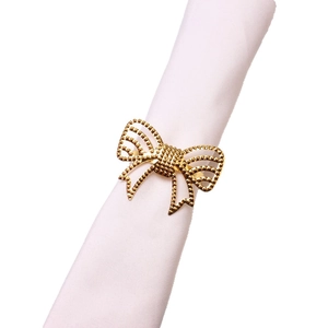 Golden butterfly napkin ring with hollow design and textured bead finish for table decor