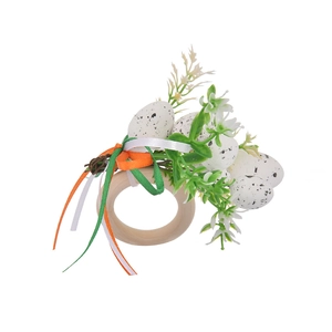 Easter spotted egg napkin ring with wood circle, green leaves and colorful ribbons