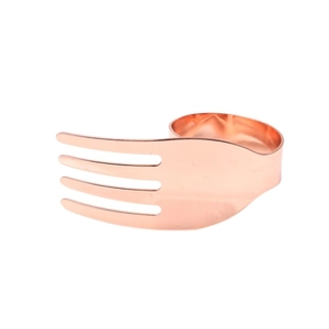 Creative rose gold cutlery shaped napkin ring featuring a unique polished fork design