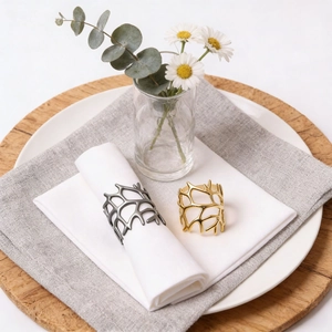 Hollow coral branch metal napkin rings in gold and gun black for elegant table settings