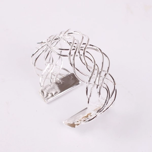 Silver woven napkin ring with an elegant multi-strand mesh design for table decoration