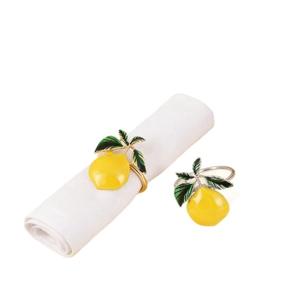 Golden lemon napkin rings with yellow enamel fruit and green leaves for table decor