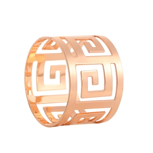 Close-up of rose gold napkin ring featuring hollow geometric Greek key pattern