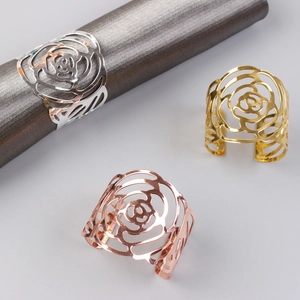 Elegant hollow rose napkin rings in gold silver and rose gold metal finish