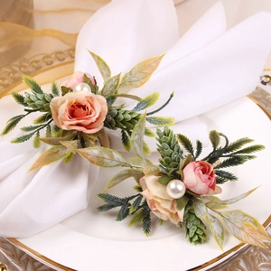 Set of two realistic peach rose napkin rings with green leaves and pearl on rope base
