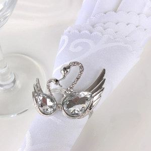 Close-up of silver swan napkin ring with sparkling crystals and teardrop rhinestones
