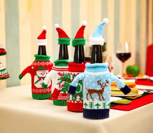 Detailed set of four knitted Christmas wine bottle sweaters with matching mini hats