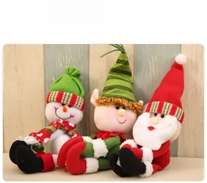 Detailed view of plush Santa, Snowman, and Elf Christmas wine bottle cover decorations